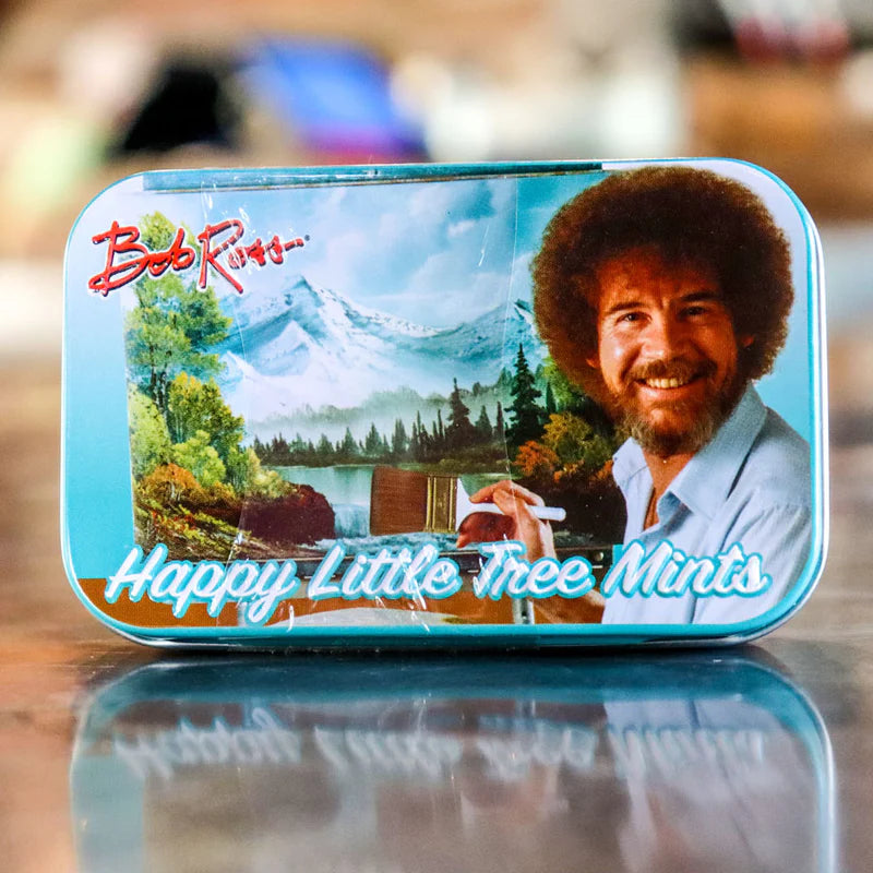 A display box of Boston America Bob Ross Happy Tree Mints with the likeness of Bob Ross on the lid.