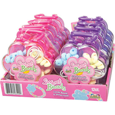 A plastic case with handle containing multiple packs of Kidsmania Sweet Beads hard candy jewelry in various colors.