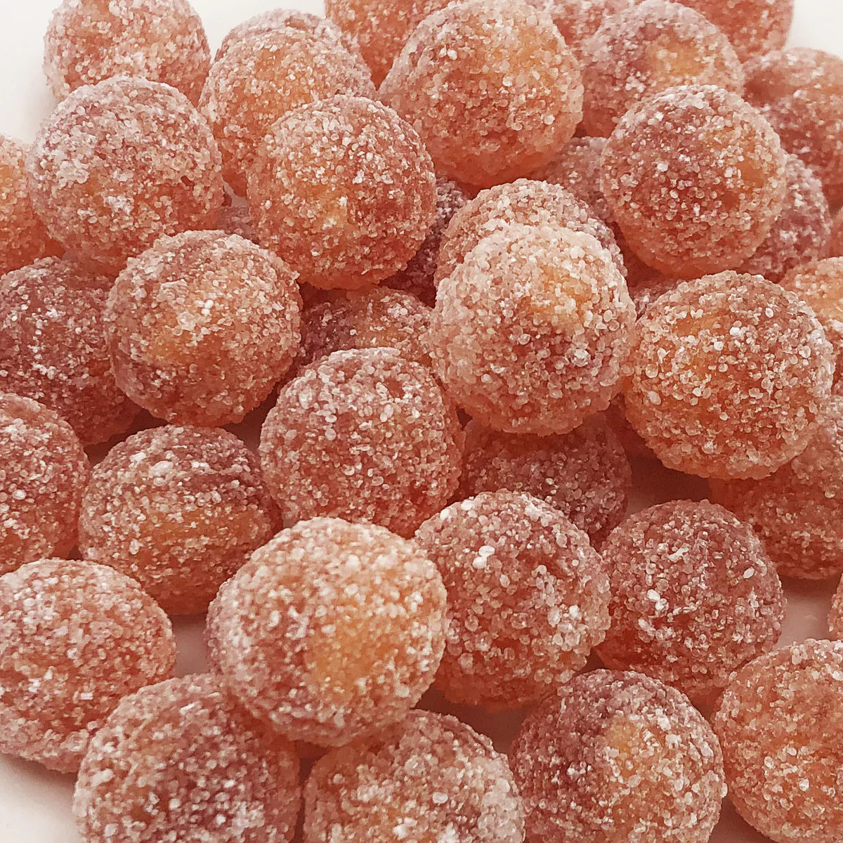 Close-up of Barnetts Mega Sour Cola sugar-coated sour candy balls