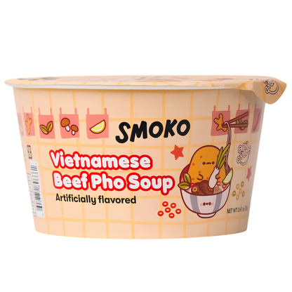 A SMOKO brand Vietnamese Beef Pho Soup cup, featuring a light peach-colored plastic container with a grid pattern, cartoon illustrations, and bold red and black text.