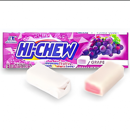 Hi-Chew grape-flavored gum mints shown with their pink and purple grape-themed packaging box and two white gum piece.