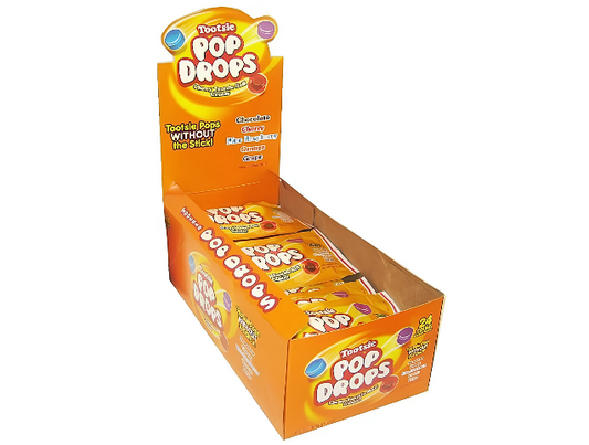 A box of Tootsie Pop Drops featuring colorful assorted hard candy shells with chewy chocolatey Tootsie Roll centers in Chocolate, Cherry, Blue Raspberry, Orange, and Grape flavors.
